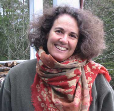 image of the author outside her home
